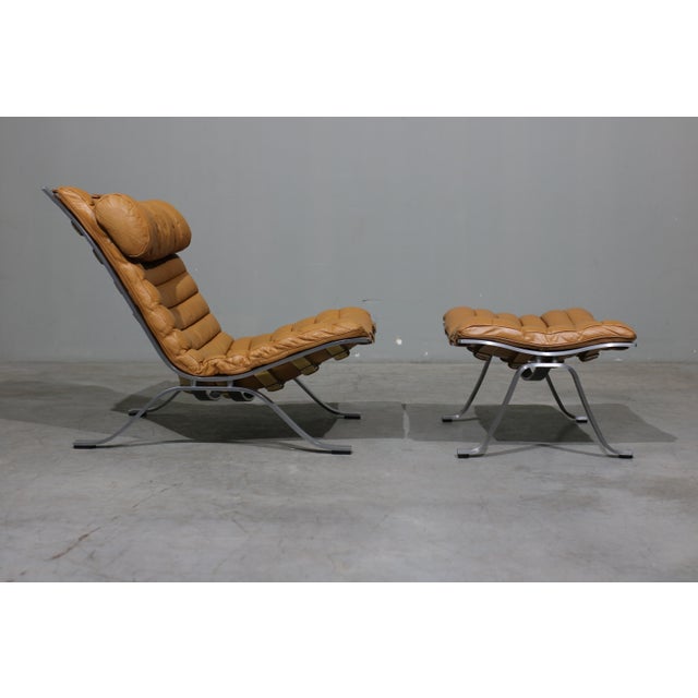 The Ari armchair by Arne Norell, designed in the 1960s, is an iconic example of Swedish mid century modern design. Defined...