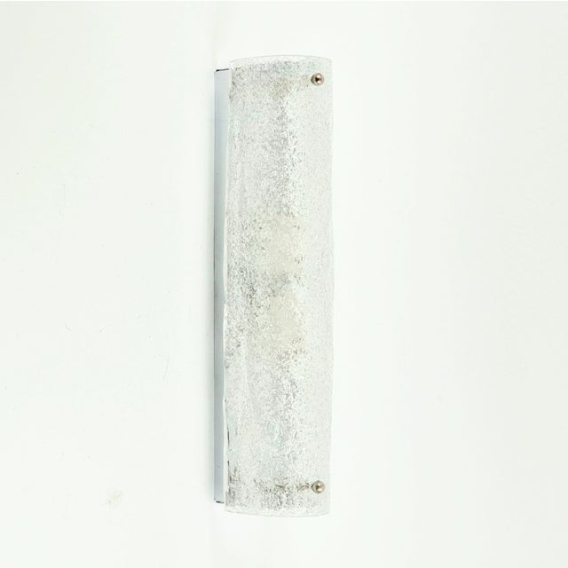 Stunning pair of tubular wall lights/sconces from Hillebrand (Germany, 1970s). The shades are made of transparent...