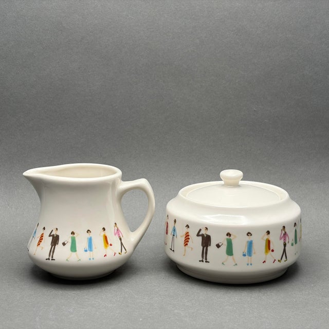 • This is a rare creamer and covered sugar bowl set from the "Fashion People" collection designed by Cynthia Rowley for...