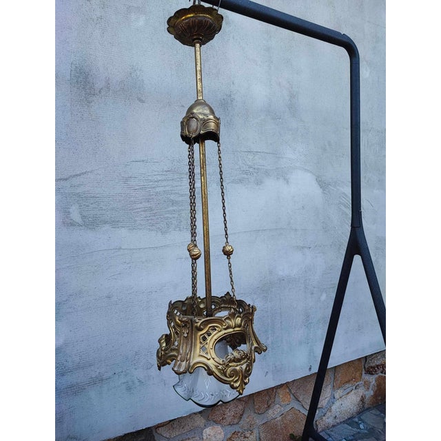Art Nouveau brass chandelier, dimensions: height 81 cm, diameter 25.5 cm. European Plug (up to 250V).The wiring of this...