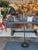 Design Plus Gallery presents an Arching Floor Lamp from Crate & Barrel. The floor lamp has a black base with a black stem...