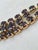 A unique vintage necklace crafted from natural faceted garnets in a deep, elegant dark burgundy hue. The jewelry...