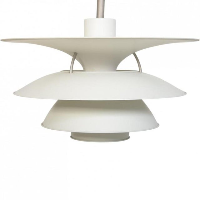 Poul henningsen ph6½-6 charlottenborg lamp with white metal shades. The lamp is from the 1990s and appears in good...