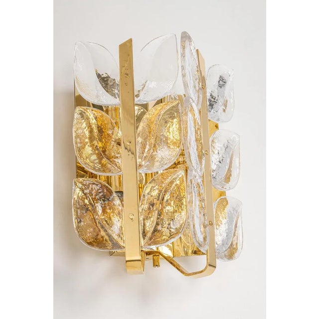 Wonderful mid-century wall sconces with 12 murano glass pieces on a brass frame, made by kalmar, austria. Manufactured...