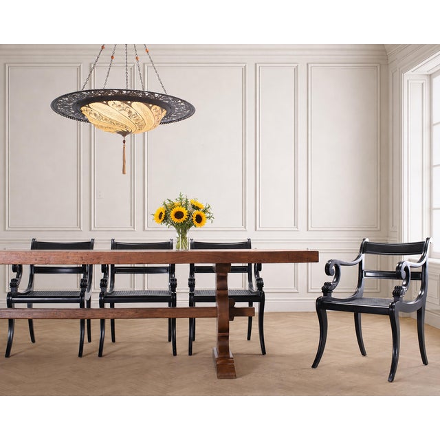 An elegant Italian bronze and silk "Scudo Saraceno" classic silk chandelier lamp made by Fortuny in Venice. The...