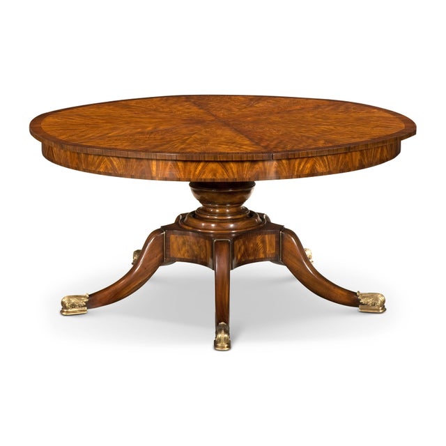 The English Dining Table is a masterpiece of elegance and functionality, perfect for sophisticated dining spaces. Crafted...