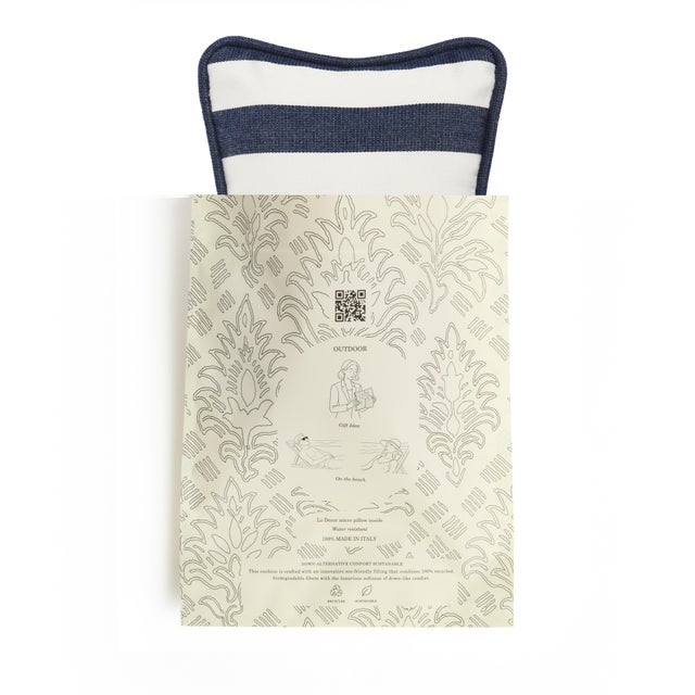 Bring a fresh Mediterranean touch to your outdoor spaces with this elegant striped cushion. Handcrafted in Italy from...