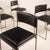 A striking set of six sq dining chairs designed in italy in the 1970s, distinguished by their rigorous geometric...