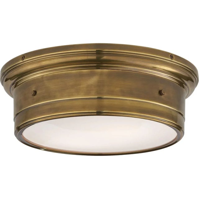 Siena Large Flush Mount in Hand-Rubbed Antique Brass with White Glass Designer: Mounting: Flush Shade Detail: White Glass...