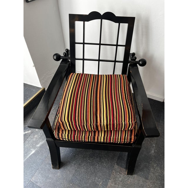 A timelessly designed armchair, a so-called "Canadian" style chair, from the early 20th century. This exceptional piece of...