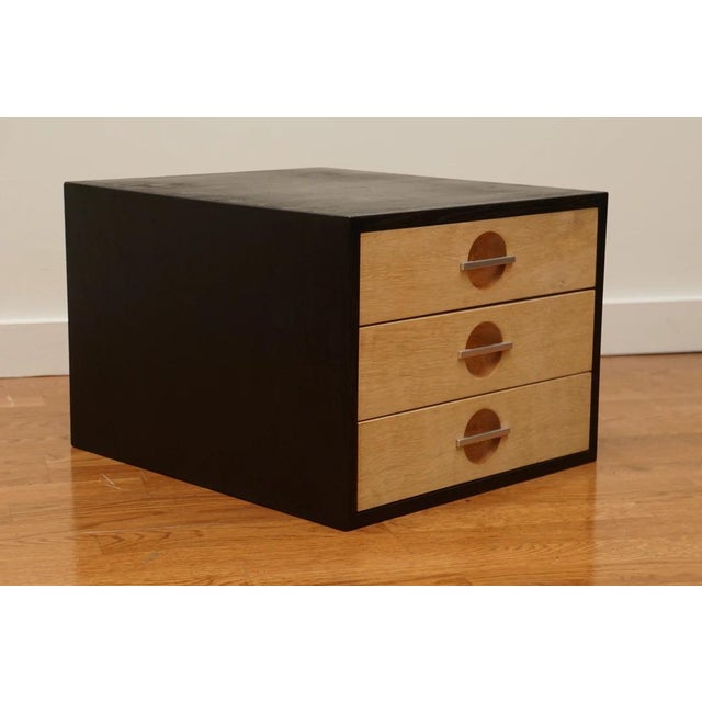 Small three drawer cabinet designed by Hans Wegner for Johannes Hansen. Accented with polished chrome drawers....