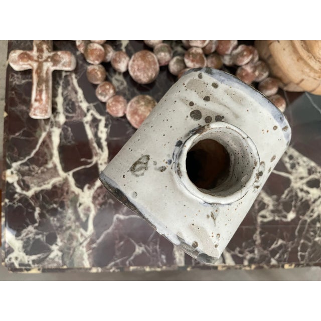 Fabulous ceramic face vase. Double-sided, featuring a man on either side. Shades of terracotta, blue and white. Signed...