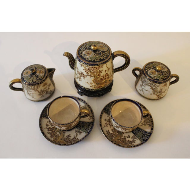 Beautifully detailed hand painted 5 Piece Sozan Tea Service including tea pot, sugar and creamer jars, and pair of cups...