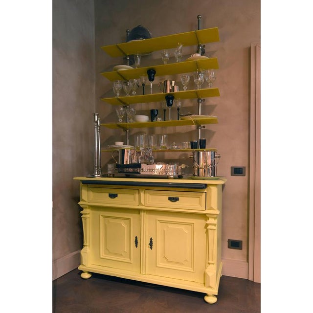 Italy Mid-19th Century yellow lacquered wood and glass shelves buffet in farmhouse style This cheerful yellow wood...