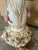 Vintage porcelain lamp with original fabric shade. Vibrant pink, blue, green and gold accents.