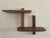Handmade solid walnut midcentury modern wall shelf. Hangs by two hidden brackets. Rounded and beveled edge makes for a...