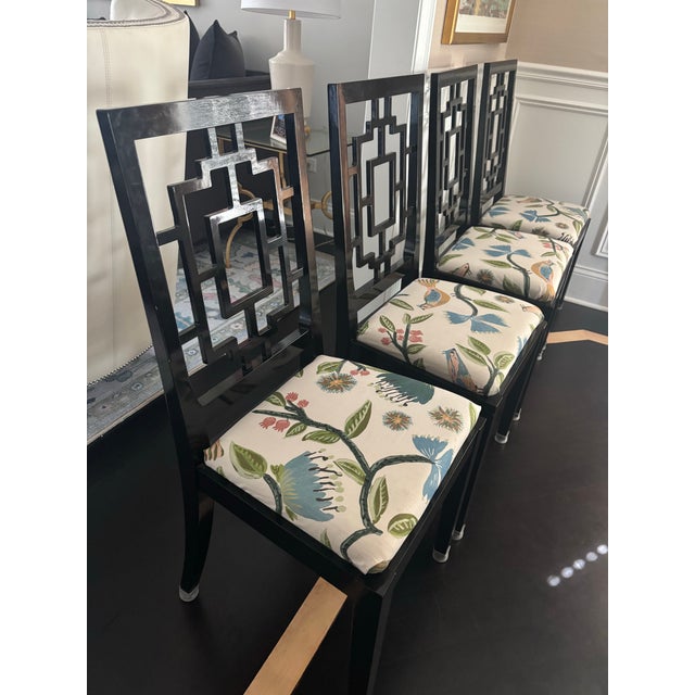 Set of 4 luxury black lacquered dining chairs designed by Jean Claude Mahey for Roche Bobois from the 1980s. These...