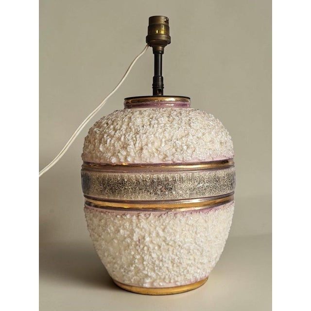 A ceramic lamp signed Louis Dage in the 1940s. Louis Dage (1885–1961) was a French ceramist renowned for his major role in...