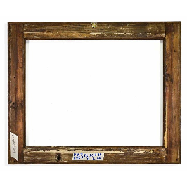 Elegant Italian rectangular frame crafted in solid wood and veneered in richly figured walnut, characterized by a broad...