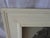 Natural black sea fan displayed in a custom shadow box behind glass. The frame was created from salvaged wood molding....