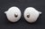 Vintage cabinet or drawer knobs made of white ceramic with a round shape. Mounting screws are included. Good condition...