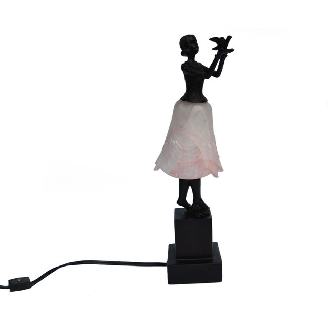 Art Deco Bruno Zach attributed Bronze Sculpture of a female dancer, featuring a dark bronze patinated body and a flowing...