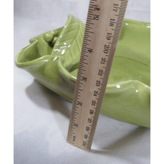 This is so charming and so mid century. Vintage green color , lots of detail, no damage. Made in the USA, quite large 11"...