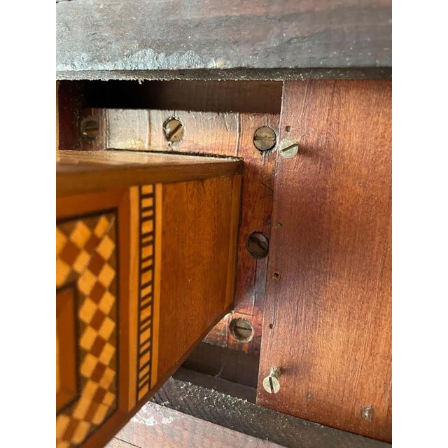 An exceptional feat of craftsmanship in exotic woods inlay marquetry side table/accent table with 2 lined drawers. This...