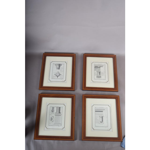 Set of four architectural engravings depicting classical column and entablature studies, including Doric, Tuscan and...