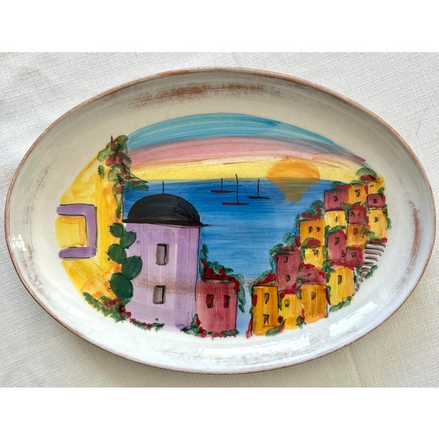 Stunning pair of large Vietri La Fenice platters, hand-painted in Italy and showcasing the vibrant artistry for which...