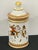 French Greek Revival Porcelain Apothecary jar, decorated front and back with two different vignettes, with Greek Key and...