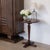Lovely wood side table from France, 1940s. Thick circular top rests on a curved tapered base with four feet. Original...