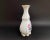 A collectible vintage flower vase made in France by the famous Limoges manufactory, c. 1980s. This exquisite item is...