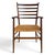 A sculptural Italian armchair confidently attributed to Chiavari, this elegant mid-20th century design exemplifies the...
