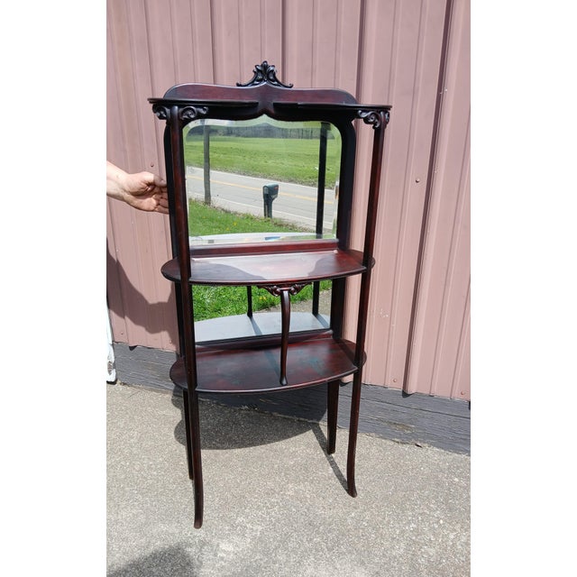 Antique Victorian Mahogany Etagere 3 Tiers With Mirrors 1910 An antique Victorian mahogany etagere featuring three tier...