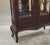 This is a very nice antique carved mahogany French Victorian style curio display cabinet, c1940s. No manufacturers mark...