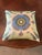 This decorative square silk throw pillow features the iconic Hermes design. It is an example of luxury upcycling, where a...