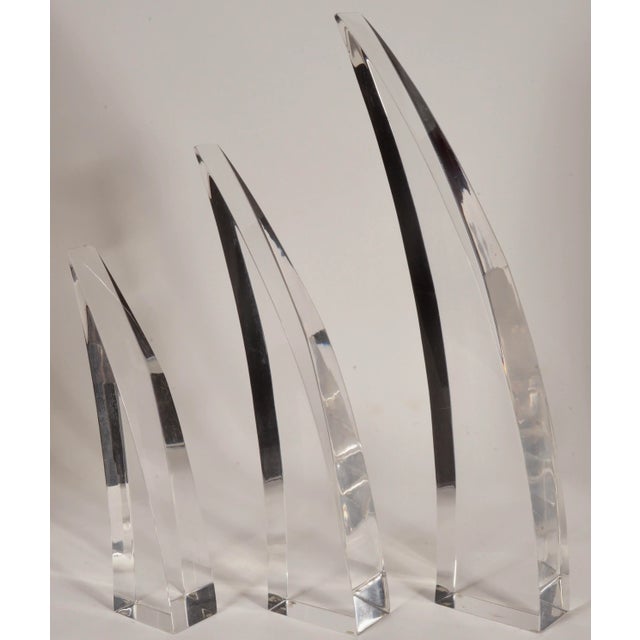 A spectacular set of lucite Tusks by Herb Ritts. These lucite Tusks look terrific anywhere you place them, the angled...