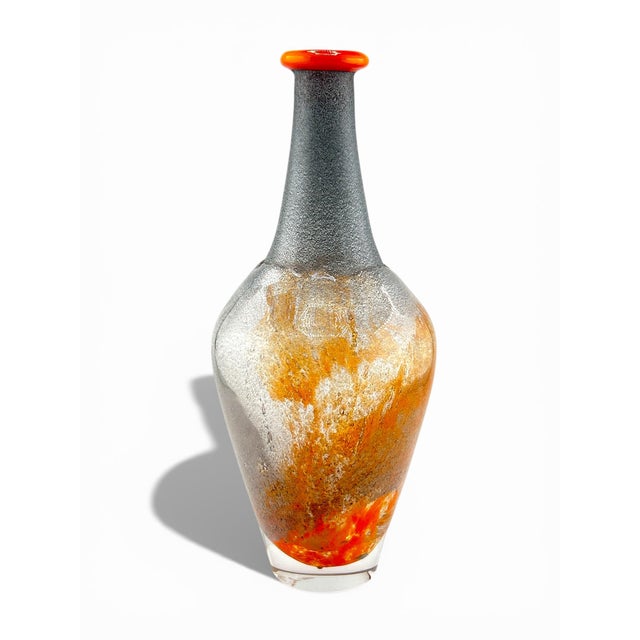 Stunning art glass vase from Kosta Boda by Monica Backstrom. Stunning bright orange rim fading to gray and back to orange...