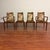 Set of four vintage dining chairs, two armchairs and two side chairs, made in the U.K. by G-Plan circa 1970's. These...
