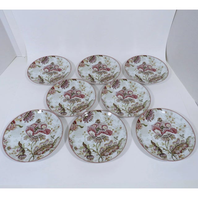 Set of 8 small plates by 222 Fifth Co., in Gabrielle pattern, Cream. The plates have an ornate Victorian-style floral...