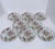 Set of 8 small plates by 222 Fifth Co., in Gabrielle pattern, Cream. The plates have an ornate Victorian-style floral...