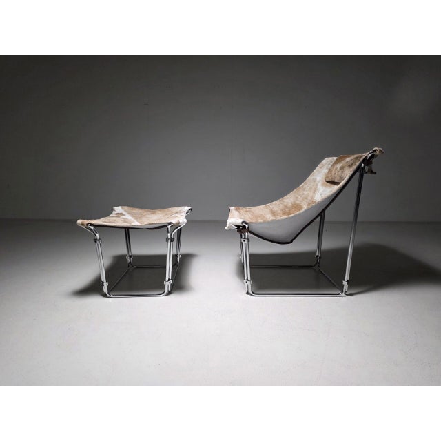 Buffalo lounge chair with matching ottoman by kwok hoi chan for steiner paris, 1960s. Featuring a sculptural chrome-plated...