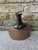 Vintage decorative pottery, 1960s-1970s. Shaped like a flask with a dark, glossy glazed neck, this pottery piece has a...
