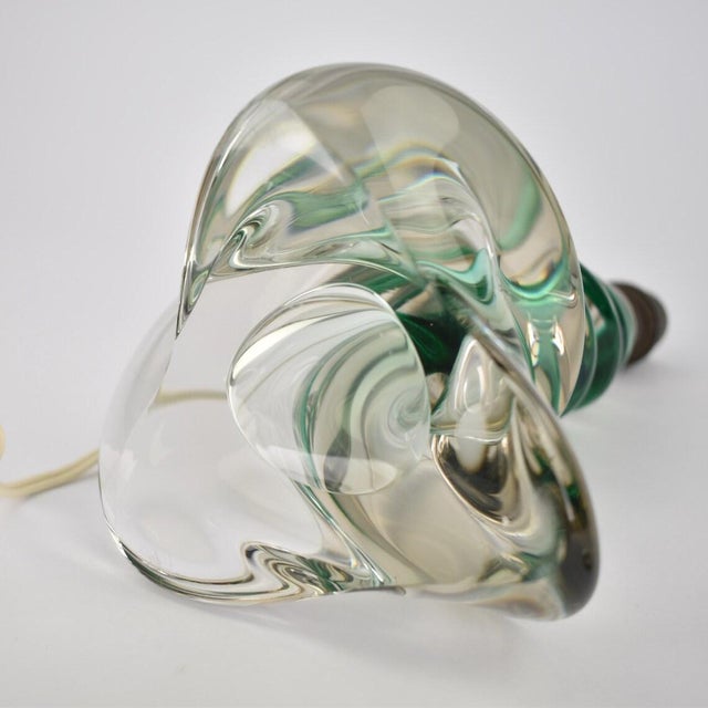 Stunning 1950s emerald green glass table lamp made in France. Heavy double tone crystal base. The lamp is in great...
