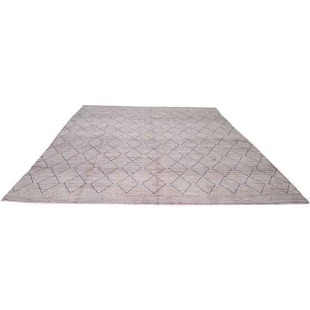 Moroccan Beni Ourain hand knotted rug with natural colors, contemporary style and soft texture.