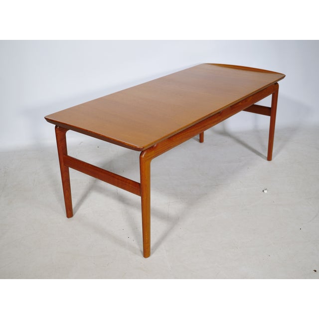 Teak coffee table, model 640, by Peter Hvidt & Orla Mølgaard-Nielsen for France & Søn / France & Daverkosen, 1960s. A...