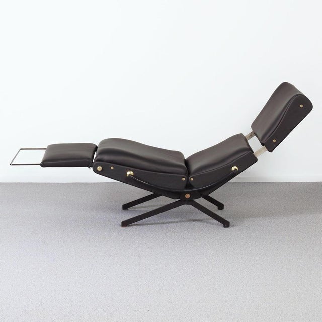 The p40 chair by osvaldo borsani for tecno from the 1950s is an italian design icon that unites comfort and engineering in...