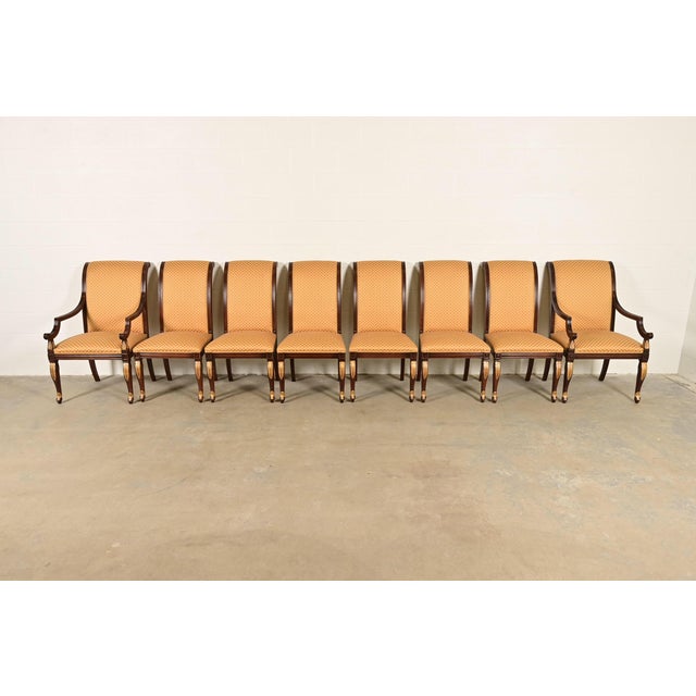 A gorgeous set of eight Regency, Neoclassical, or Empire style dining chairs In the manner of Baker Furniture USA, Circa...