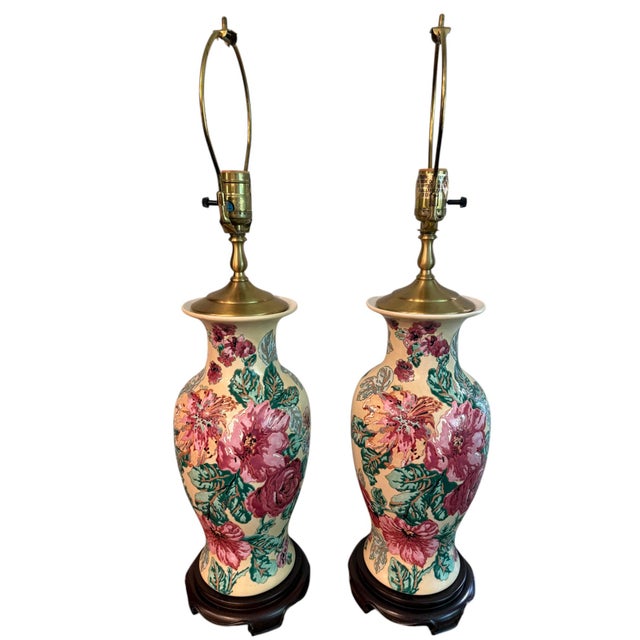 Wescal Porcelain Floral Lamps on Wood Stands - A Pair These lamps have a cream base with embossed flowers. There are pink...